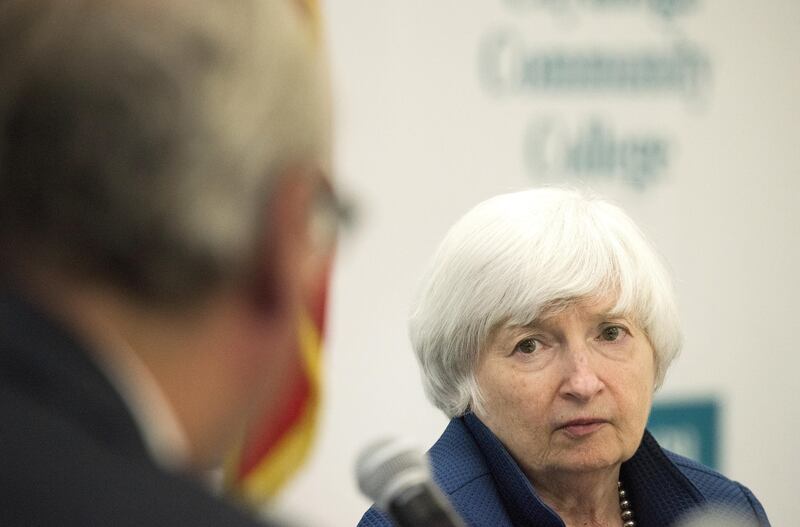 Janet Yellen, chair of the U.S. Federal Reserve, listens during a round table event at Cuyahoga Community College in Cleveland, Ohio, U.S., on Tuesday, Sept. 26, 2017. Yellen said on Tuesday that while uncertainty is high around the forces keeping inflation low, the U.S. central bank���s most likely strategy is to continue raising borrowing costs anyway. Photographer: Ty Wright/Bloomberg