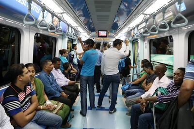 Passengers on the Dubai Metro are asked to follow a list of rules or face fines. Pawan Singh / The National