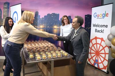 Chicago Mayor Lori Lightfoot greets employees returning to work at Google's office Chicago in April. Photo: AFP
