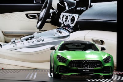 The new Mercedes-Benz AMG GT R is unveiled during the Mercedes-Benz AG media night ahead of the Paris Motor Show in Paris, France, on Wednesday, Sept. 28, 2016. Ford Motor Co. and Rolls-Royce are among the companies skipping the car show, also known as Mondial de L'Automobile, as the once-unmissable event succumbs to changes sweeping the auto industry. Photographer: Jasper Juinen/Bloomberg
