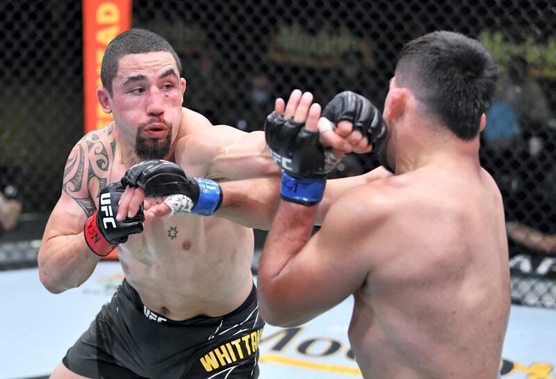 LAS VEGAS, NEVADA - APRIL 17: (L-R) Robert Whittaker of Australia punches Kelvin Gastelum in a middleweight fight during the UFC Fight Night event at UFC APEX on April 17, 2021 in Las Vegas, Nevada. (Photo by Chris Unger/Zuffa LLC) *** Local Caption *** LAS VEGAS, NEVADA - APRIL 17: (L-R) Robert Whittaker of Australia punches Kelvin Gastelum in a middleweight fight during the UFC Fight Night event at UFC APEX on April 17, 2021 in Las Vegas, Nevada. (Photo by Chris Unger/Zuffa LLC)