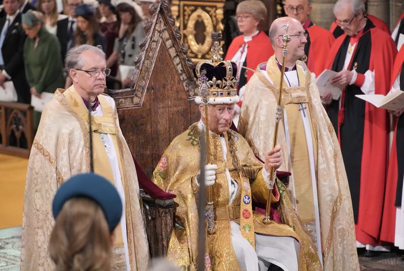 King Charles III is crowned with St Edward's Crown by The Archbishop of Canterbury Justin Welby during his coronation ceremony in Westminster Abbey in May 2023. PA