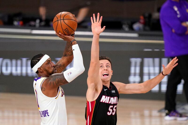 Lakers' Kentavious Caldwell-Pope shoots over Duncan Robinson of Miami. AP Photo
