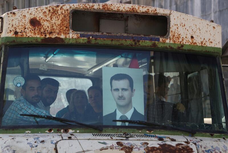 A busload of voters on the way to polling station in Damascus to cast their vote during the presidential elections in Syria. Reuters