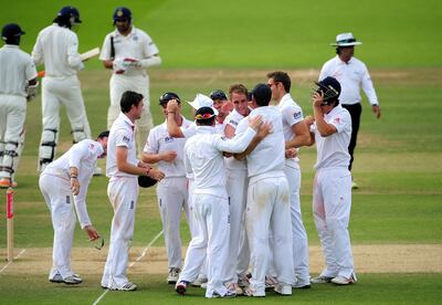 LONDON, ENGLAND - JULY 25:  England bowler Stuart Broad (c) celebrates with team mates after taking the final wicket of the India innings of Ishant Sharma to win the match during day five of the 1st npower test match between England and India at Lords on July 25, 2011 in London, England.  (Photo by Stu Forster/Getty Images)