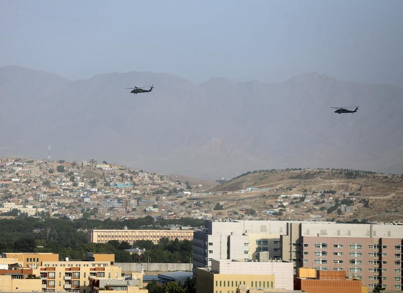 NATO helicopters fly over the city of Kabul, Afghanistan June 29. 2020. REUTERS/Omar Sobhani