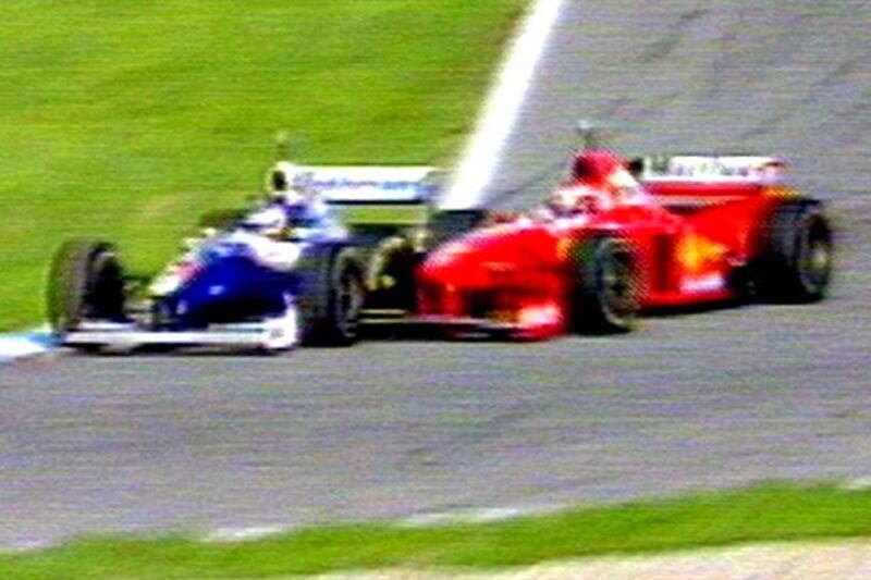 German Michael Schumacher's Ferrari crashes into the left side of Canadian Jacques Villeneuve's William-Renault 26 October during the season-ending European Formula One Grand Prix in Jerez. Schumacher was forced to quit the race following the accident. Villeneuve won the driver's world champion title after placing third behind winner Mika Hakkinen of Finland on McLaren-Mercedes and his second-placed teammate David Coulthard of Scotland.