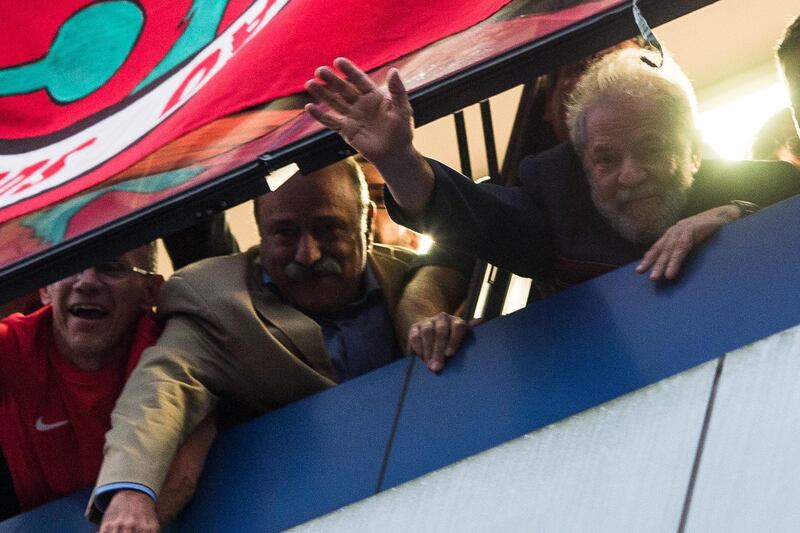 SAO BERNARDO DO CAMPO, BRAZIL - APRIL 06: Former President Luiz Inacio Lula da Silva greets his supporters from a window of the Metalworkers' Union on April 6, 2018 in Sao Bernardo do Campo, Brazil. The former president's arrest was decreed and must turn himself in by April 6 to the Superintendence of the Federal Police in the city of Curitiba. (Photo by Victor Moriyama/Getty Images)