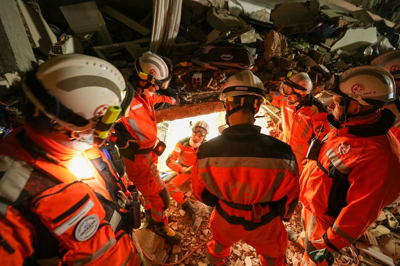Rescue workers sent by Bern to Turkey pull earthquake victims out alive. AFP