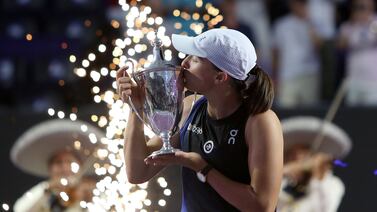 Iga Swiatek won the 2023 WTA Finals trophy in Cancun, Mexico. The season-ending championships heads to Riyadh for the next three years. EPA
