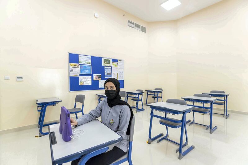 SHARJAH, UNITED ARAB EMIRATES. 05 JANUARY 2021. Just 12 percent of Sharjah pupils have returned to school in the new semester. Partualy empty classes at Al Shola Private School where teachers use an online platform to teach the present pupils while students who opted to stay at home are logged in on the learning platform. An empty grade 10 classroom with only one student present. (Photo: Antonie Robertson/The National) Journalist: Salam Al Amir. Section: National.