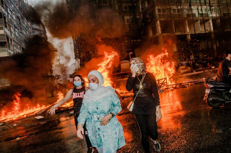 First day of protest. Nour, Nour and Farah protesting. Someone asked me what is the place of women in this revolution. A lot of injonctions are addressed to women in Lebanon. But this is not a gendered revolution. It is for everyone.