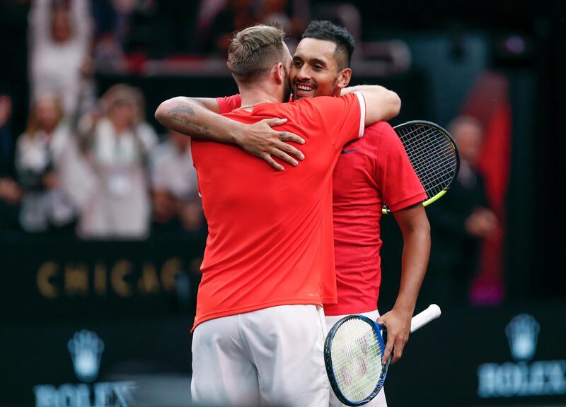Team World's Nick Kyrgios, right, celebrates with Jack Sock, left, after they defeated Team Europe's David Goffin and Grigor Dimitrov in a doubles match at the Laver Cup tennis event, Saturday, Sept. 22, 2018, in Chicago. (AP Photo/Kamil Krzaczynski)