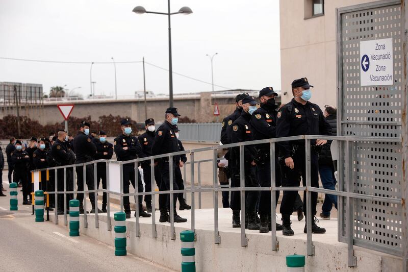 Local police officers queue to be vaccinated in Valencia, Spain. EPA
