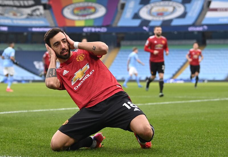 Manchester United's Bruno Fernandes celebrates scoring their side's first goal of the game during the Premier League match at the Etihad Stadium, Manchester. Picture date: Sunday March 7, 2021. PA Photo. See PA story SOCCER Man City. Photo credit should read: Laurence Griffiths/PA Wire.

RESTRICTIONS: EDITORIAL USE ONLY No use with unauthorised audio, video, data, fixture lists, club/league logos or "live" services. Online in-match use limited to 120 images, no video emulation. No use in betting, games or single club/league/player publications.