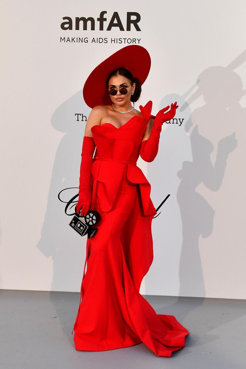 Austrian entrepreneur Karolina Zubkova-Mattes at the amFAR gala in a very costumey look. Photo: AFP