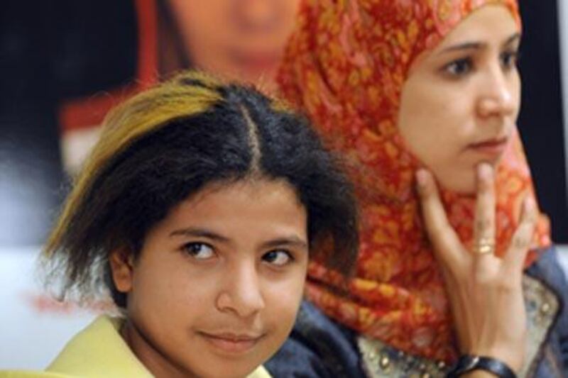 Child bride Nojoud Ali, left, who at 11 years old, sought a divorce from her 30-year-old husband.