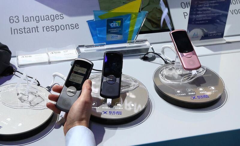 The iFLYTEK Easy Trans 2.0 Portable Smart Electronic Voice Language Translator device is shown. AP Photo