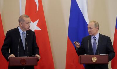 FILE PHOTO: Russian President Vladimir Putin (R) and  Turkish President Recep Tayyip Erdogan (L) attend a joint news conference following Russian-Turkish talks in the Black sea resort of Sochi, Russia October 22, 2019. Sergei Chirikov/Pool via REUTERS/File Photo