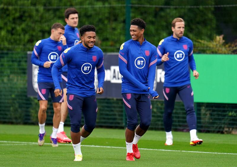 Jude Bellingham, second right, and Reece James at the Hotspur Way Training Ground ahead of their World Cup 2022 qualifying match against Andorra on Sunday. AP