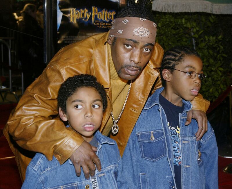 With sons Melan, left and Darius at the Los Angeles premiere of 'Harry Potter and the Chamber of Secrets' in 2002. Reuters