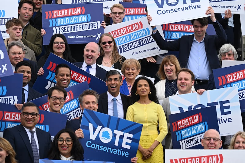 Mr Sunak and Akshata Murty take centre stage at the Conservative Party's general election manifesto launch in Towcester. Getty Images