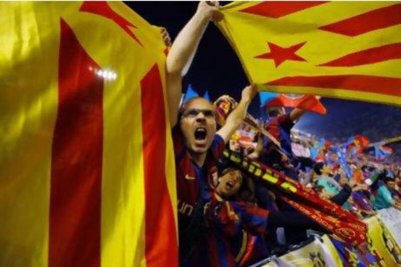 Barcelona fans wave pro independence Catalonia flags during the Copa del Rey final against Real Madrid. Andres Kudacki / AP Photo