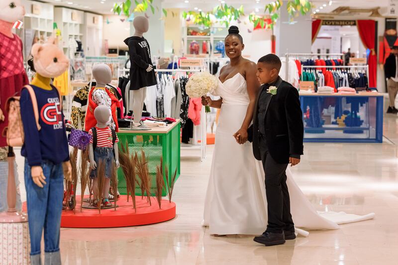 The Sains family's special day also included a piano lesson on the giant FAO Schwarz piano in the store’s toy department.