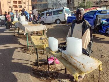 Selling ice blocks on the street amid rising temperatures during Ramadan, in Gedaref, eastern Sudan. AFP