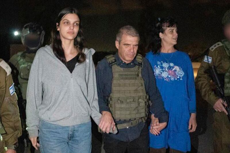 US citizens Judith Raanan and her daughter Natalie with Israel soliders after their release by Hamas. AP Photo