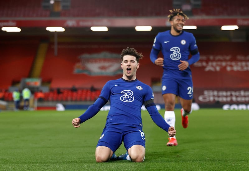 LIVERPOOL, ENGLAND - MARCH 04: Mason Mount of Chelsea celebrates after scoring his team's first goal during the Premier League match between Liverpool and Chelsea at Anfield on March 04, 2021 in Liverpool, England. Sporting stadiums around the UK remain under strict restrictions due to the Coronavirus Pandemic as Government social distancing laws prohibit fans inside venues resulting in games being played behind closed doors. (Photo by Phil Noble - Pool/Getty Images)