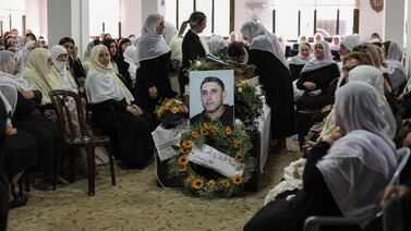 Family members and relatives from the Druze village of Ain Kenia, in the controlled Golan Heights, attend the funeral of Zaher Bishara, 38, who was killed by a Hezbollah rocket launched from south Lebanon and struck an industrial building in the northern Israeli town of Kiryat Shmona. EPA