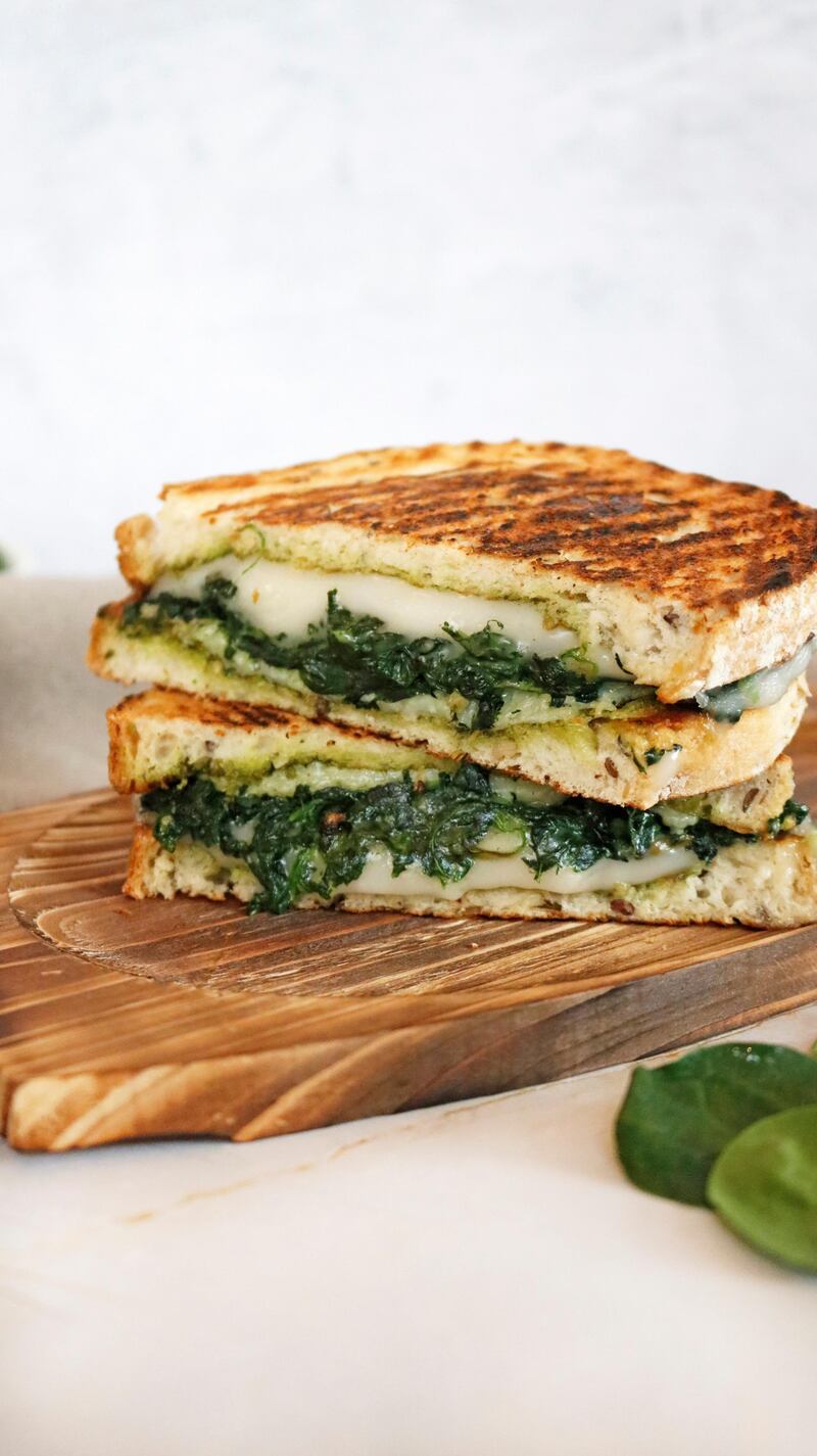 The grilled 'cheese' sandwich (Dh34). Fresh spinach, fresh basil, pine nuts, walnuts, vegan 'cheese', lemon juice, extra virgin oil, country bread, served with crunchy fries. Courtesy Bloom Vegan Kitchen