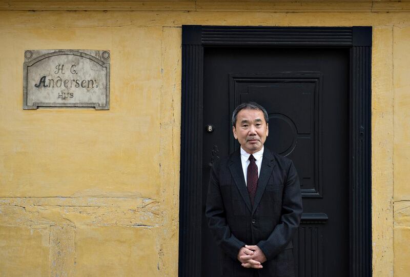 Japanese writer Haruki Murakami is pictured outside Hans Christian Andersen's house in Odense, on October 30, 2016.  
Murakami is visiting Odense, where he will receive the Hans Christian Andersen Literature Award 2016. / AFP PHOTO / Scanpix Denmark / Henning Bagger / Denmark OUT