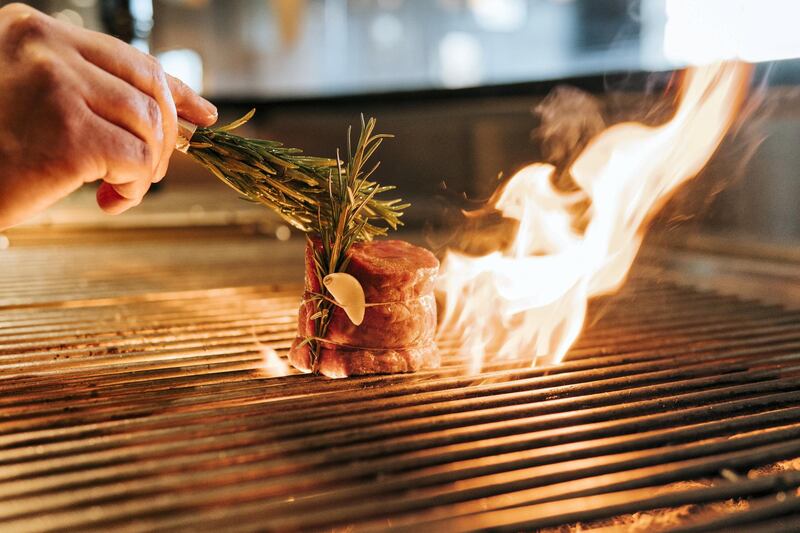 Aromatic steak being cooked at The Grill, Marriott Hotel Al Forsan