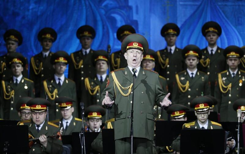 Soloist Vladislav Golikov sings during a concert of the Academic Song and Dance Ensemble of the Russian Army, part of the Alexandrov Ensemble, in Moscow on May 7, 2014. Yuri Kochetkov / EPA
