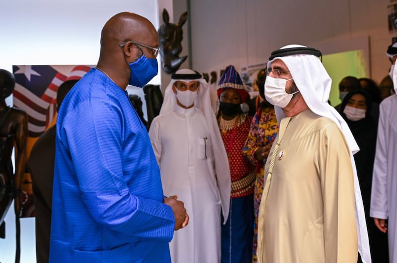 Sheikh Mohammed also met Liberian President George Weah at his country's pavilion. 