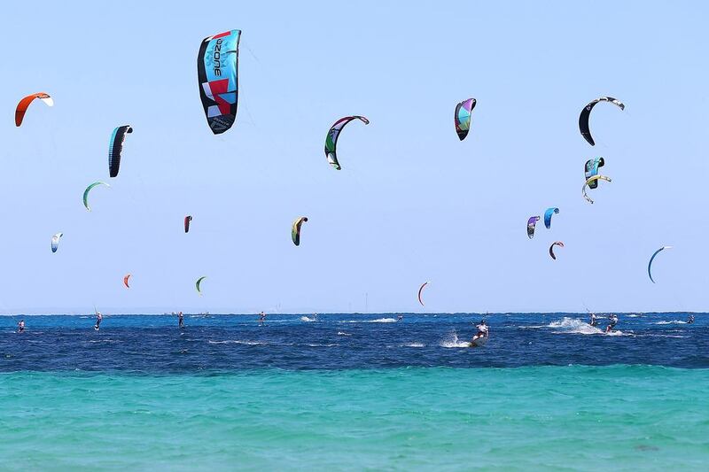 Kitesurfers get ready to race at Rottnest Island, Western Australia, for the Red Bull Lighthouse to Leighton race. Paul Kane / Getty Images
