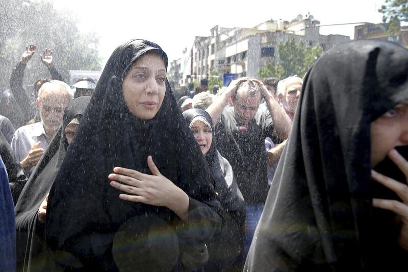 Iranians attend the funeral on June 9, 2017 of victims of an ISIL militant twin attacks on in Tehran, Iran which killed 17 people in Tehran this week. Ebrahim Noroozi/AP Photo