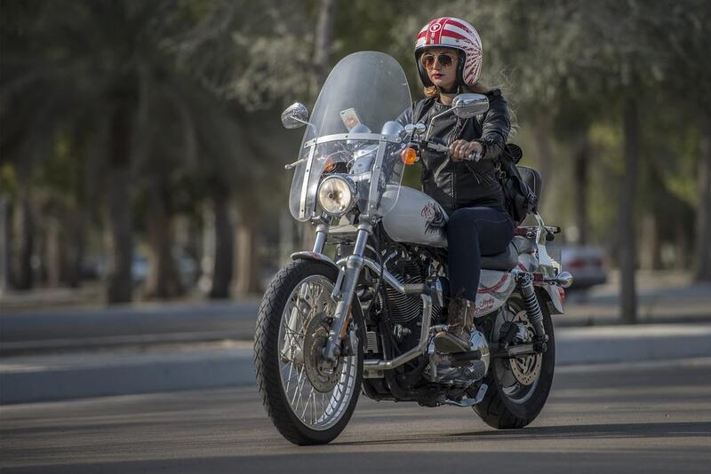 Gabrielle Bou Rached rides her Harley-Davidson to work in Abu Dhabi. Vidhyaa for The National