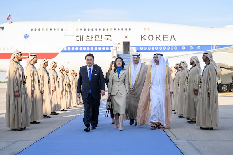 Sheikh Abdullah receives Mr Yoon and the first lady at the Presidential Airport in Abu Dhabi. Sheikh Abdullah is accompanied by Khaldoon Al Mubarak, member of the Abu Dhabi Executive Council, chairman of the Executive Affairs Authority and managing director and group chief executive of Mubadala Investment Company