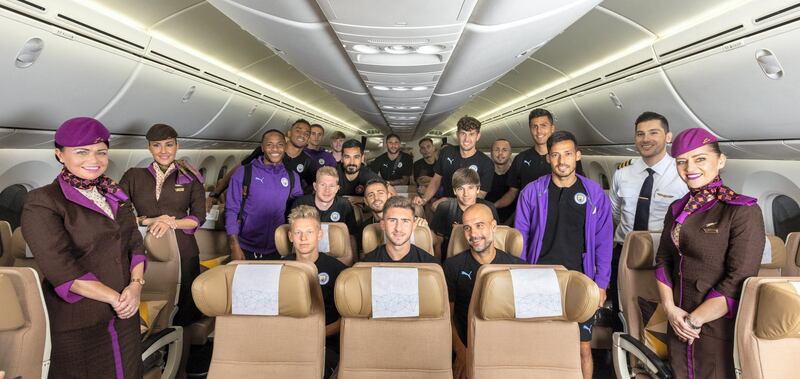 On the aircraft chartered for the flight to China from Abu Dhabi, are Manchester City's travelling squad including manager Pep Guardiola, Aymeric Laporte and Oleksandr Zinchenko, David Silva, Bernardo Silva, Kevin De Bruyne, Raheem Sterling, Danilo, Rodri, John Stones, Ilkay Gundogan and Kyle Walker. Photo by Etihad Airways