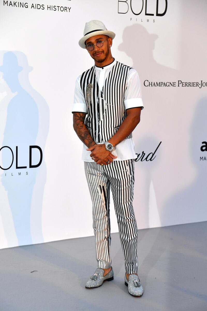 British Formula One driver Lewis Hamilton arrives on May 17, 2018 for the amfAR 25th Annual Cinema Against AIDS gala at the Hotel du Cap-Eden-Roc in Cap d'Antibes, southern France, during the 71th Cannes Film Festival. (Photo by ALBERTO PIZZOLI / AFP)