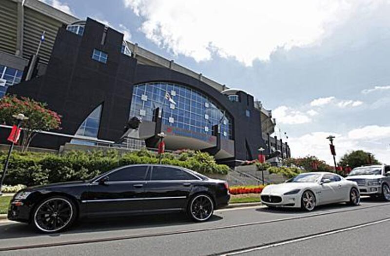 Carolina Panthers players' cars fill the parking lot outside Bank of America Stadium in Charlotte.