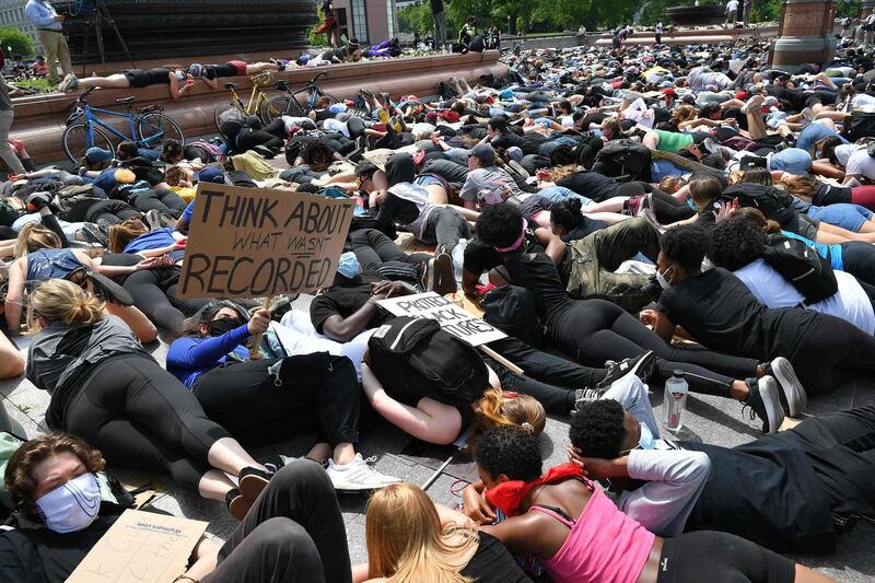 People lay down in protest for the death of George Floyd near the US Capitol, in Washington, DC. AFP