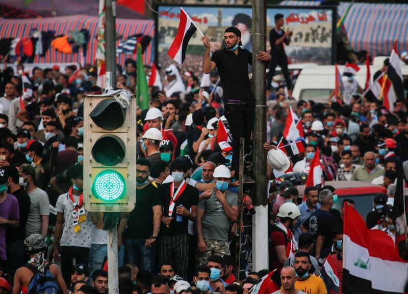 Demonstrators take part in a protest in Baghdad. Reuters