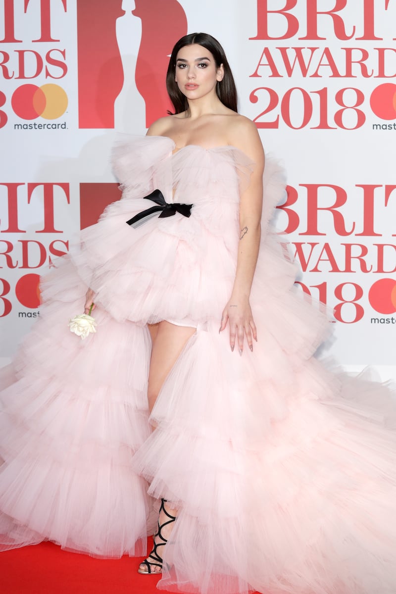 Dua Lipa, in Giambattista Valli, attends the Brit Awards at The O2 Arena on February 21, 2018 in London, England. Getty
