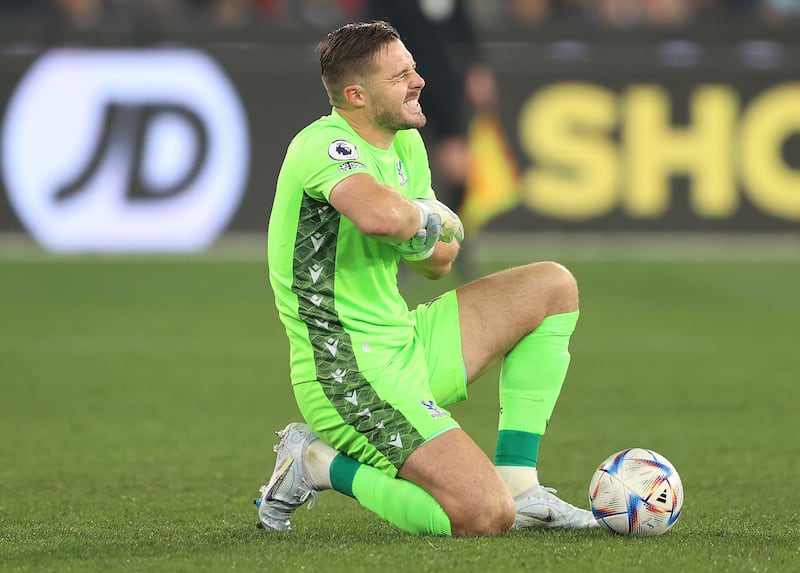 Crystal Palace goalkeeper Jack Butland in pain after saving a first-half shot from Anthony Martial. Butland was forced off due to the injury. Getty