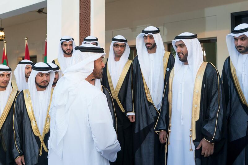 ABU DHABI, UNITED ARAB EMIRATES - November 15, 2018: HH Sheikh Mohamed bin Zayed Al Nahyan, Crown Prince of Abu Dhabi and Deputy Supreme Commander of the UAE Armed Forces (C), speaks with grooms during a mass wedding held at Majlis Al Manhal. 

( Rashed Al Mansoori / Ministry of Presidential Affairs )
---