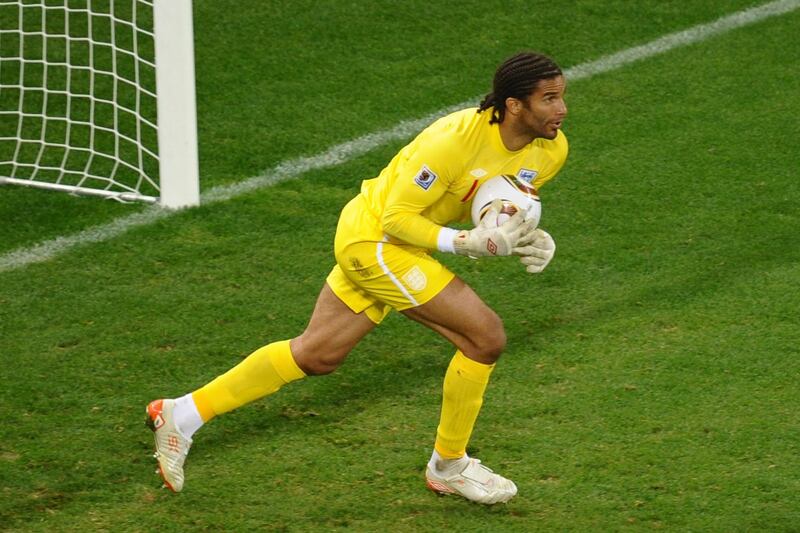 England's goalkeeper David James makes a save during the Group C first round 2010 World Cup football match England vs. Algeria on June 18, 2010 at Green Point stadium in Cape Town. NO PUSH TO MOBILE / MOBILE USE SOLELY WITHIN EDITORIAL ARTICLE   -       AFP PHOTO / HOANG DINH NAM / AFP PHOTO / HOANG DINH NAM